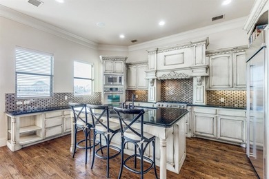 Set on a premier golf course lot with breathtaking sunset views on The Trails of Frisco Golf Club in Texas - for sale on GolfHomes.com, golf home, golf lot