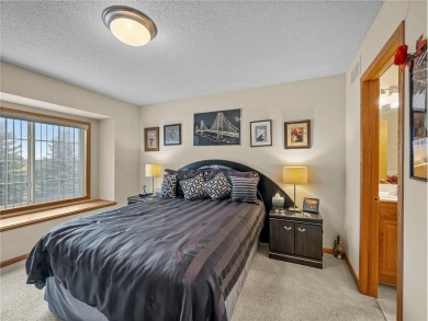Welcome to this well-maintained 2-bedroom, 3-bath townhome on The Wilds Golf Club in Minnesota - for sale on GolfHomes.com, golf home, golf lot