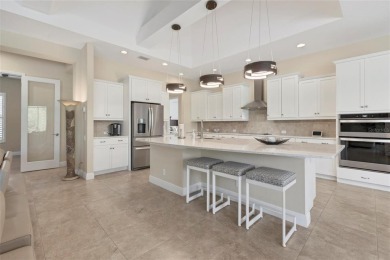 This exquisitely built Napoli Model, Sam Rodgers 3/3/3 home in on Plantation Golf and Country Club in Florida - for sale on GolfHomes.com, golf home, golf lot