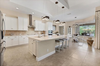 This exquisitely built Napoli Model, Sam Rodgers 3/3/3 home in on Plantation Golf and Country Club in Florida - for sale on GolfHomes.com, golf home, golf lot