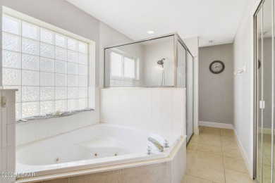 Welcome to this charming three-bedroom, two-bathroom home with on The Golf Club At Cypress Head in Florida - for sale on GolfHomes.com, golf home, golf lot