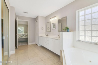 Welcome to this charming three-bedroom, two-bathroom home with on The Golf Club At Cypress Head in Florida - for sale on GolfHomes.com, golf home, golf lot