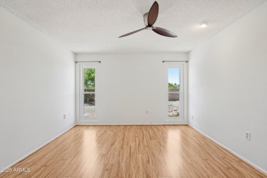 Welcome to this beautifully maintained Highland model home in on Sun City Lakes West and East in Arizona - for sale on GolfHomes.com, golf home, golf lot