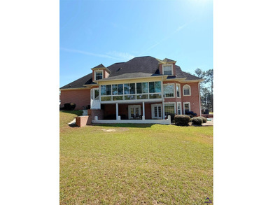 Experience elevated living in this stunning all-brick estate on Southern Hills Golf Club in Georgia - for sale on GolfHomes.com, golf home, golf lot