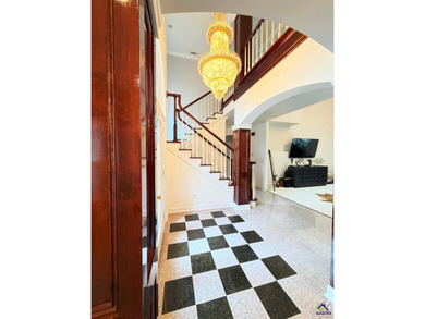 Experience elevated living in this stunning all-brick estate on Southern Hills Golf Club in Georgia - for sale on GolfHomes.com, golf home, golf lot