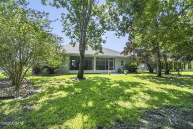 Welcome to this charming three-bedroom, two-bathroom home with on The Golf Club At Cypress Head in Florida - for sale on GolfHomes.com, golf home, golf lot
