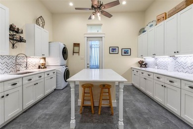 Stunning custom home on .72 acres surrounded by beautiful golf on Cedar Creek Country Club in Texas - for sale on GolfHomes.com, golf home, golf lot