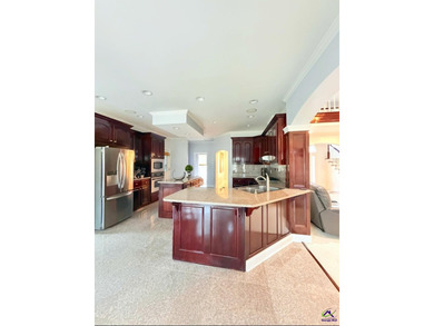 Experience elevated living in this stunning all-brick estate on Southern Hills Golf Club in Georgia - for sale on GolfHomes.com, golf home, golf lot