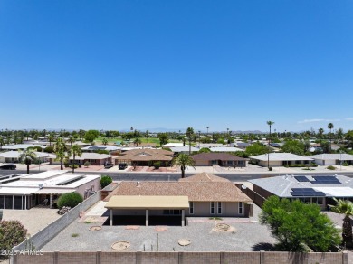 Welcome to this beautifully maintained Highland model home in on Sun City Lakes West and East in Arizona - for sale on GolfHomes.com, golf home, golf lot