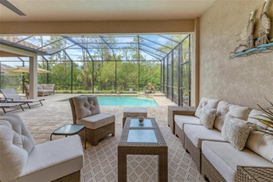 This exquisitely built Napoli Model, Sam Rodgers 3/3/3 home in on Plantation Golf and Country Club in Florida - for sale on GolfHomes.com, golf home, golf lot