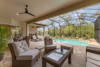 This exquisitely built Napoli Model, Sam Rodgers 3/3/3 home in on Plantation Golf and Country Club in Florida - for sale on GolfHomes.com, golf home, golf lot