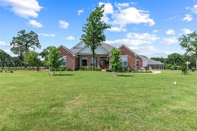 Stunning custom home on .72 acres surrounded by beautiful golf on Cedar Creek Country Club in Texas - for sale on GolfHomes.com, golf home, golf lot