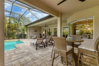 This exquisitely built Napoli Model, Sam Rodgers 3/3/3 home in on Plantation Golf and Country Club in Florida - for sale on GolfHomes.com, golf home, golf lot