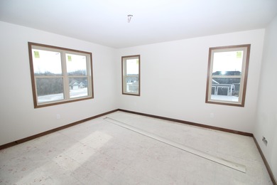 The Emerson is a 3 bed, 2.5 bath home on a lookout basement lot on Twin Lakes Country Club in Wisconsin - for sale on GolfHomes.com, golf home, golf lot