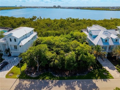 Paradise awaits you at this vacant lot within the stunning gated on Hideaway Beach Golf Course in Florida - for sale on GolfHomes.com, golf home, golf lot