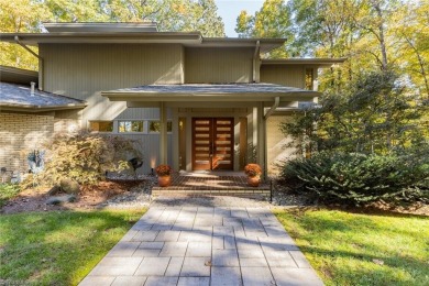 Stunning Mid-Century Home with Views of the 14th hole at on Colonial Country Club in North Carolina - for sale on GolfHomes.com, golf home, golf lot