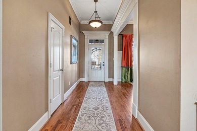 This truly custom residence is rich in architectural detail on The Patriot Golf Club At Grand Harbor in South Carolina - for sale on GolfHomes.com, golf home, golf lot