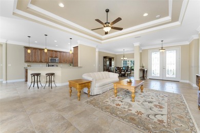 Laid Back Luxury with a 3-Car Garage and Private Pool in Rotonda on Pinemoor West Golf Club in Florida - for sale on GolfHomes.com, golf home, golf lot