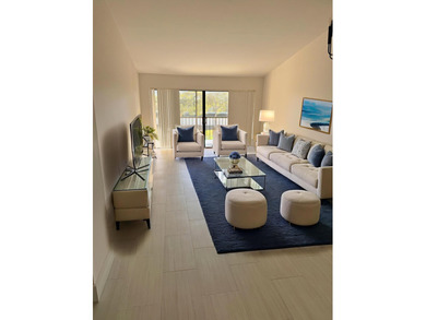 UPDATED 2ND FLOOR CONDO FEATURING WHITE EAT-IN KITCHEN WITH NEW on Boca Delray Golf and Country Club in Florida - for sale on GolfHomes.com, golf home, golf lot