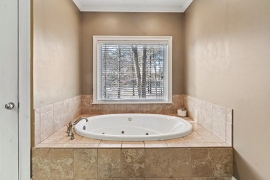 This truly custom residence is rich in architectural detail on The Patriot Golf Club At Grand Harbor in South Carolina - for sale on GolfHomes.com, golf home, golf lot