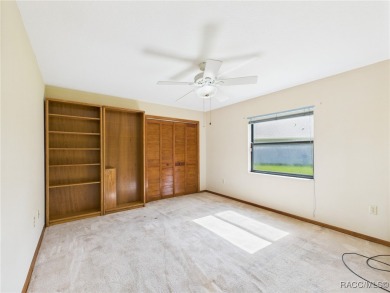 Discover this spacious 3/2.5/2 residence nestled on a cul-de-sac on Sugarmill Woods Golf and Country Club in Florida - for sale on GolfHomes.com, golf home, golf lot
