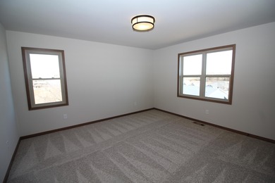 The Emerson is a 3 bed, 2.5 bath home on a lookout basement lot on Twin Lakes Country Club in Wisconsin - for sale on GolfHomes.com, golf home, golf lot