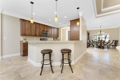 Laid Back Luxury with a 3-Car Garage and Private Pool in Rotonda on Pinemoor West Golf Club in Florida - for sale on GolfHomes.com, golf home, golf lot