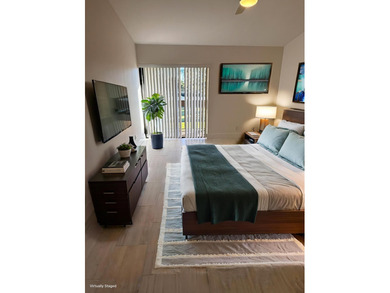 UPDATED 2ND FLOOR CONDO FEATURING WHITE EAT-IN KITCHEN WITH NEW on Boca Delray Golf and Country Club in Florida - for sale on GolfHomes.com, golf home, golf lot