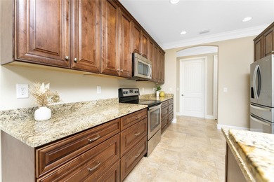 Laid Back Luxury with a 3-Car Garage and Private Pool in Rotonda on Pinemoor West Golf Club in Florida - for sale on GolfHomes.com, golf home, golf lot