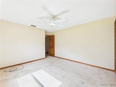 Discover this spacious 3/2.5/2 residence nestled on a cul-de-sac on Sugarmill Woods Golf and Country Club in Florida - for sale on GolfHomes.com, golf home, golf lot