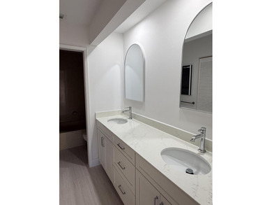 UPDATED 2ND FLOOR CONDO FEATURING WHITE EAT-IN KITCHEN WITH NEW on Boca Delray Golf and Country Club in Florida - for sale on GolfHomes.com, golf home, golf lot