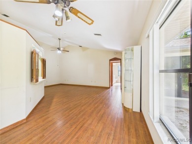 Discover this spacious 3/2.5/2 residence nestled on a cul-de-sac on Sugarmill Woods Golf and Country Club in Florida - for sale on GolfHomes.com, golf home, golf lot