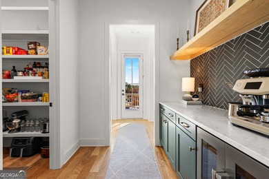 Experience elevated living in this better-than-new 2024 home on Canongate At Flat Creek Club in Georgia - for sale on GolfHomes.com, golf home, golf lot