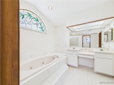 Discover this spacious 3/2.5/2 residence nestled on a cul-de-sac on Sugarmill Woods Golf and Country Club in Florida - for sale on GolfHomes.com, golf home, golf lot