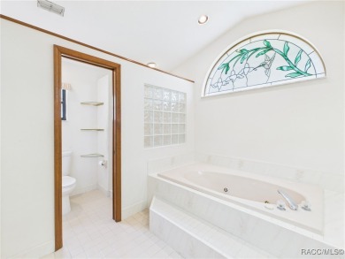 Discover this spacious 3/2.5/2 residence nestled on a cul-de-sac on Sugarmill Woods Golf and Country Club in Florida - for sale on GolfHomes.com, golf home, golf lot
