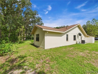 Discover this spacious 3/2.5/2 residence nestled on a cul-de-sac on Sugarmill Woods Golf and Country Club in Florida - for sale on GolfHomes.com, golf home, golf lot