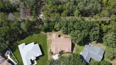 Discover this spacious 3/2.5/2 residence nestled on a cul-de-sac on Sugarmill Woods Golf and Country Club in Florida - for sale on GolfHomes.com, golf home, golf lot