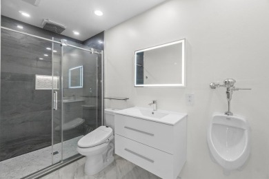 Welcome to your dream home! This totally renovated masterpiece on Delaire Golf and Country Club in Florida - for sale on GolfHomes.com, golf home, golf lot