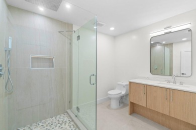 Welcome to your dream home! This totally renovated masterpiece on Delaire Golf and Country Club in Florida - for sale on GolfHomes.com, golf home, golf lot