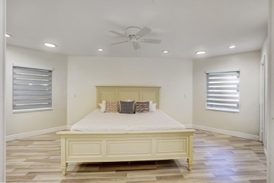 Welcome to your dream home! This totally renovated masterpiece on Delaire Golf and Country Club in Florida - for sale on GolfHomes.com, golf home, golf lot