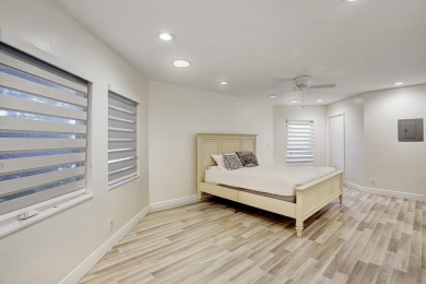 Welcome to your dream home! This totally renovated masterpiece on Delaire Golf and Country Club in Florida - for sale on GolfHomes.com, golf home, golf lot