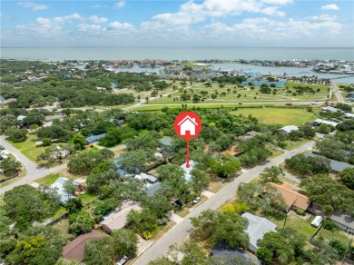 Welcome to this inviting 3-bedroom, 2-bath home nestled in the on Rockport Country Club in Texas - for sale on GolfHomes.com, golf home, golf lot