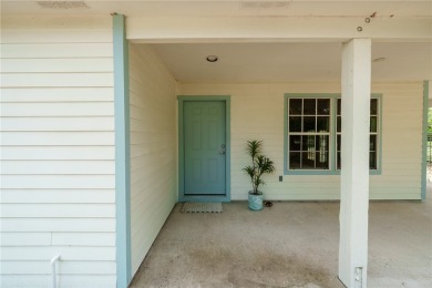 Welcome to this inviting 3-bedroom, 2-bath home nestled in the on Rockport Country Club in Texas - for sale on GolfHomes.com, golf home, golf lot