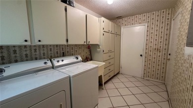 Great Twintree model available right now for move in. Located on on Caloosa Greens Executive Golf Course in Florida - for sale on GolfHomes.com, golf home, golf lot