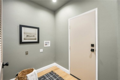 Nestled in a secure gated community within walking distance to on Tustin Ranch Golf Club in California - for sale on GolfHomes.com, golf home, golf lot