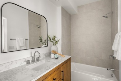Nestled in a secure gated community within walking distance to on Tustin Ranch Golf Club in California - for sale on GolfHomes.com, golf home, golf lot