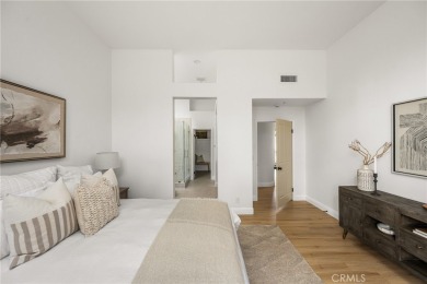 Nestled in a secure gated community within walking distance to on Tustin Ranch Golf Club in California - for sale on GolfHomes.com, golf home, golf lot