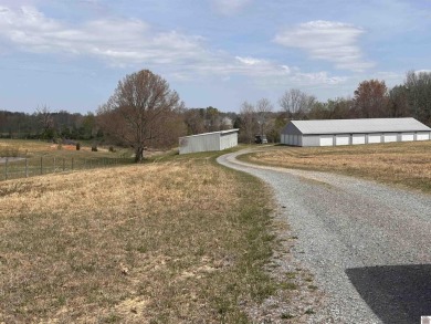 28 storage units on 3.75 acres .  There are 2 storage buildings on Arrowhead Golf Club in Kentucky - for sale on GolfHomes.com, golf home, golf lot