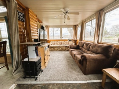 Enjoy the beauty of Pistakee Lake from this charming 1-bedroom on Pistakee Country Club in Illinois - for sale on GolfHomes.com, golf home, golf lot