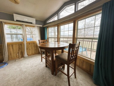 Enjoy the beauty of Pistakee Lake from this charming 1-bedroom on Pistakee Country Club in Illinois - for sale on GolfHomes.com, golf home, golf lot